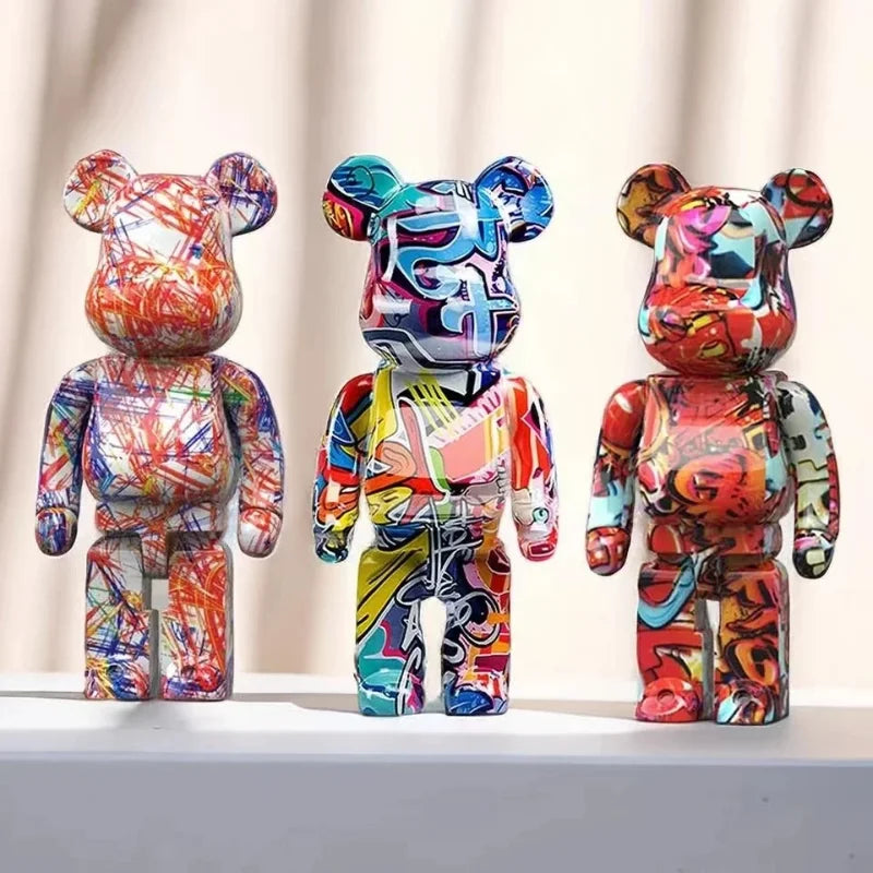 Graffiti bear money jar figurine with vibrant abstract street art design
